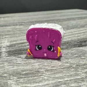 Shopkins | Bakery: Purple Lana Banana Bread (3-013) - Collectible Mini Figure